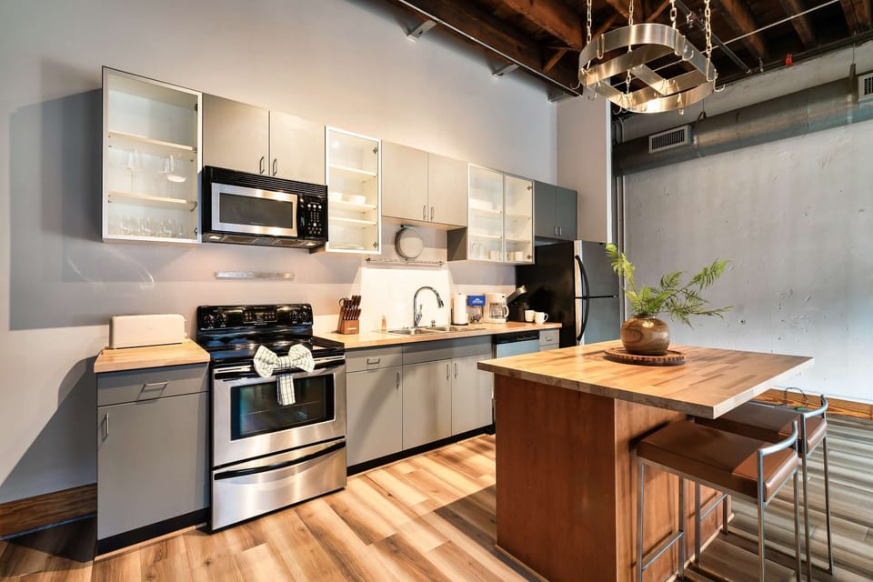 Cook up a storm in this modern kitchen with chic design and ample counter space!