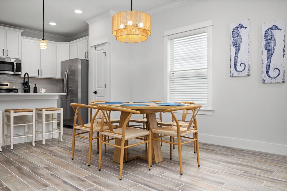 Bright dining space with easy access to kitchen and living room