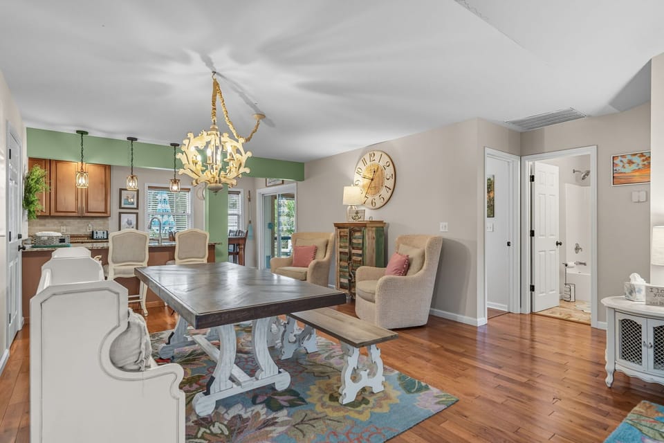 Bright Dining & Space w/ Farmhouse Table, Bench Seating, Chandelier, Eat-At Bar, Stools, Cabinetry, Appliances, Decor, And Much More