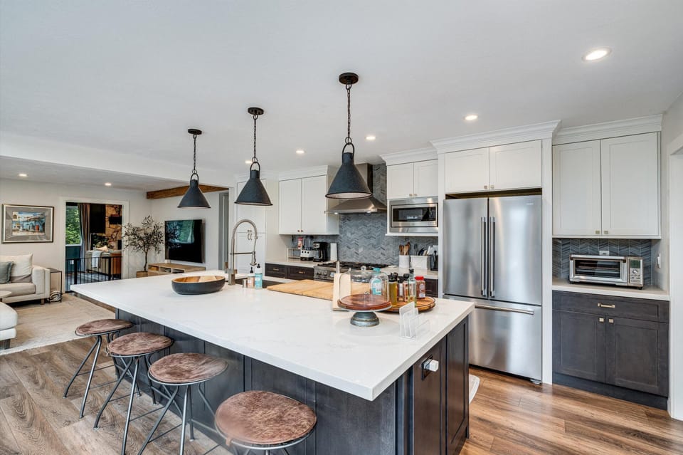 Spacious kitchen with modern appliances and cozy seating