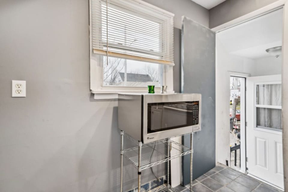 Prepare delicious home-cooked meals in this fully equipped kitchen, featuring full-sized appliances and all the essentials you need for your stay.