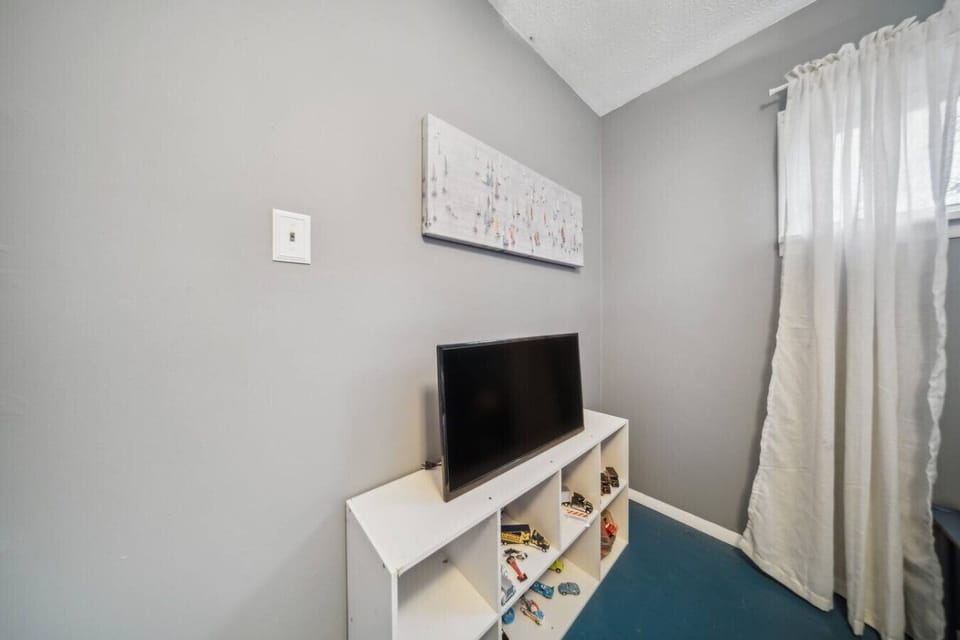 Gemini said Perfect for families, this cozy third bedroom features a sturdy twin bunk bed and a dedicated TV for a fun and comfortable stay.