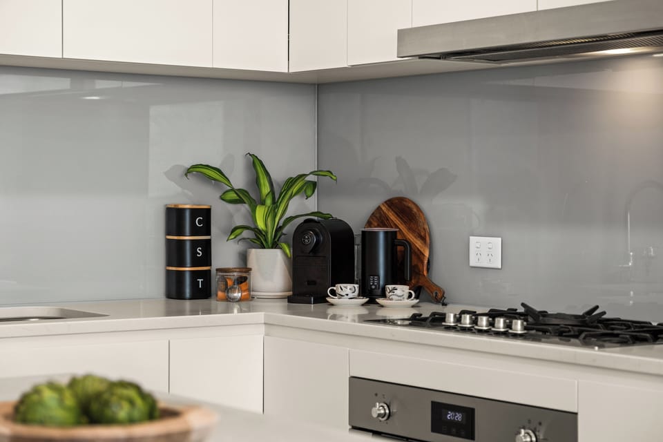 Coffee machine with complimentary coffee pods, tea, sugar, milk frother