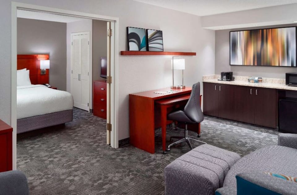 Sip morning coffee and enjoy easy in-room snack setup.