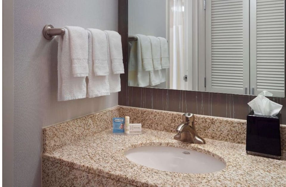 Refresh at the bright vanity with plenty of counter space.