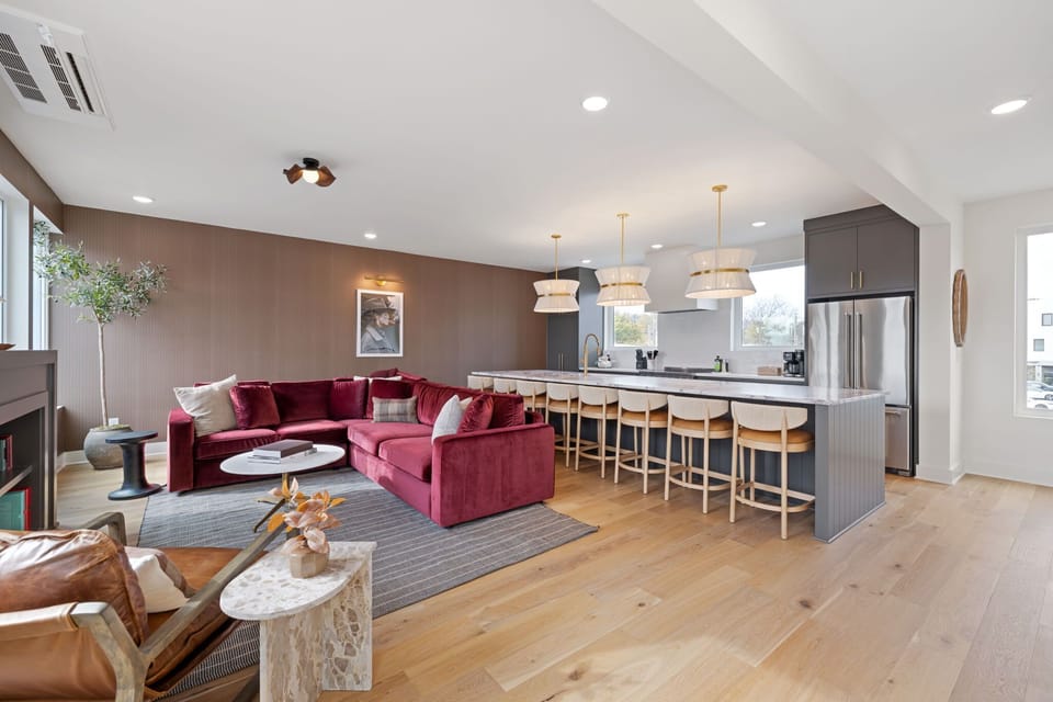 Spacious living, dining, and kitchen area perfect for group gatherings.
