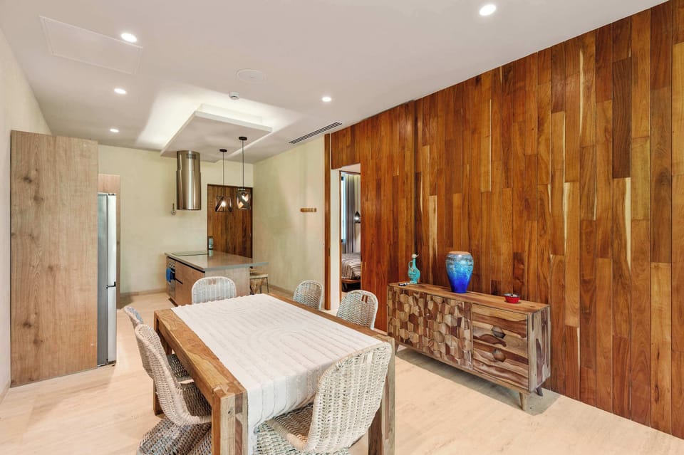 Modern dining room with wooden accents and contemporary decor