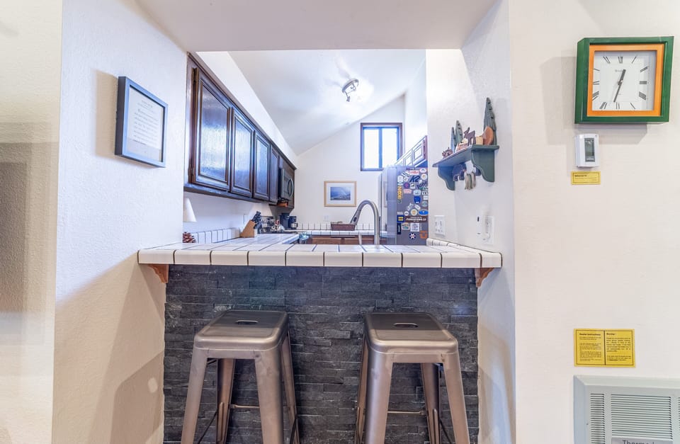 Bar seating for 2 in kitchen.