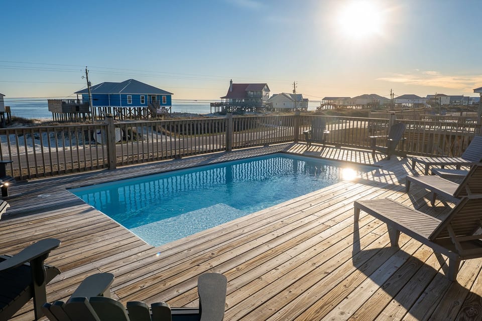 Private oceanfront pool deck with stunning coastal views and beach house charm in this elevated beachfront location.