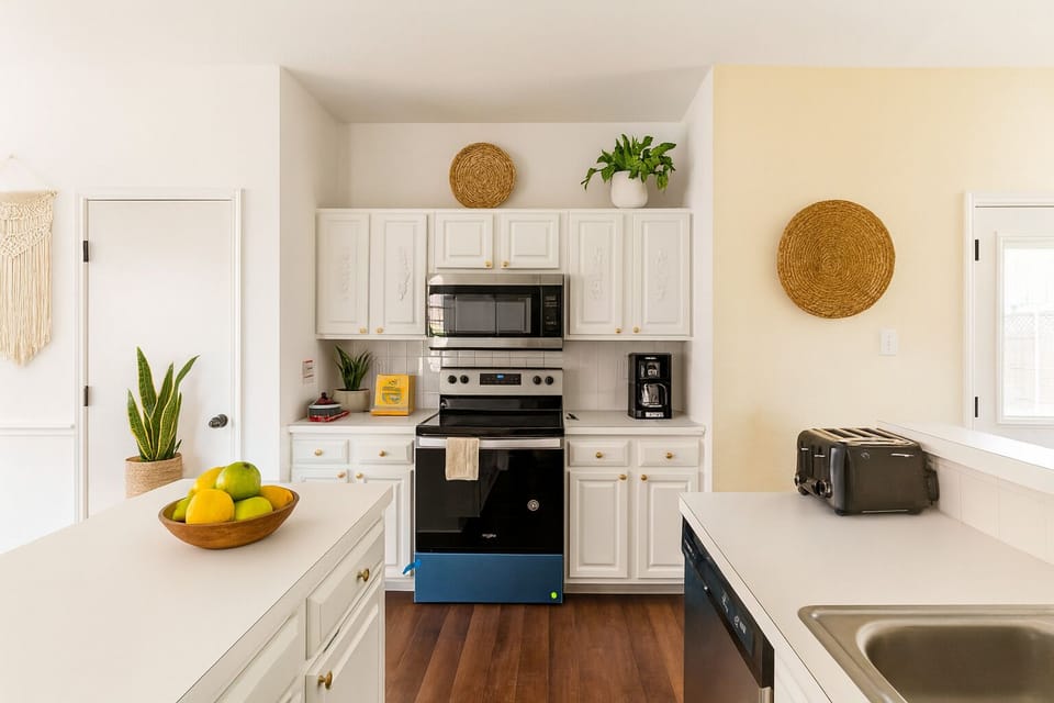 Modern Convenience: Every culinary need met in this sleek & fully equipped kitchen.