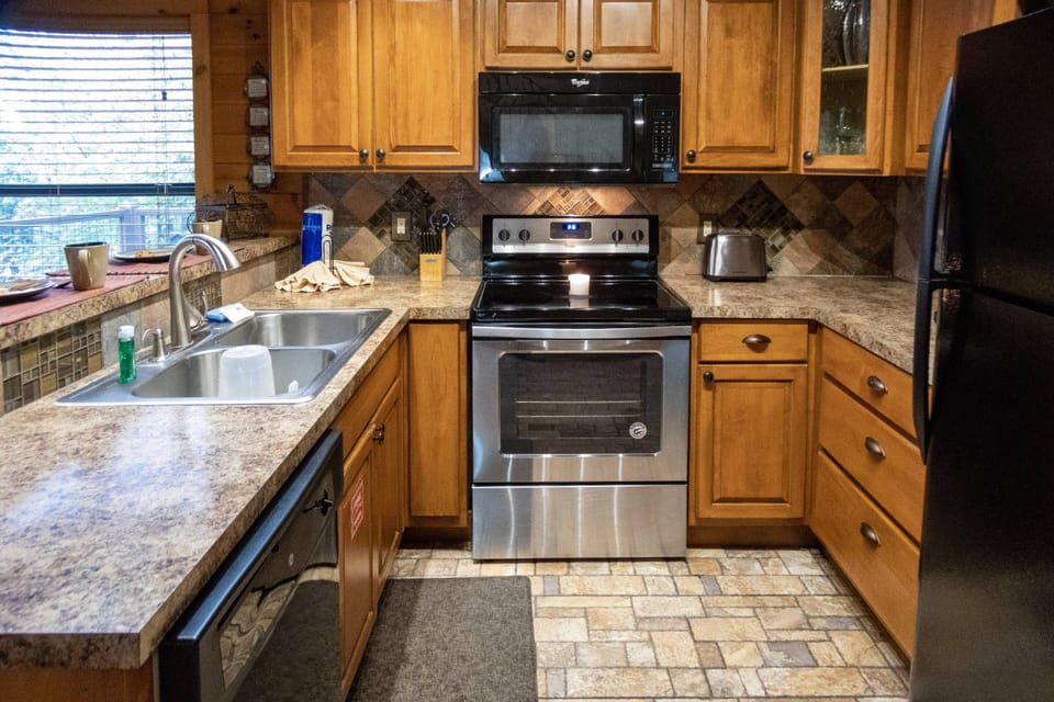 This fully equipped kitchen is perfect for making a meal or grabbing a quick snack.