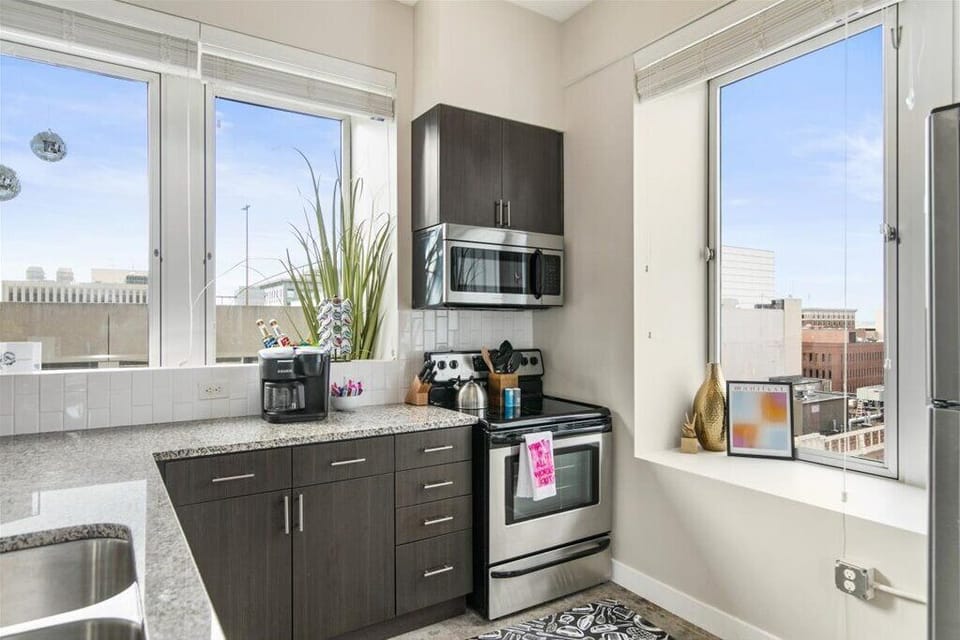 CIty views and natural light from tall windows.
