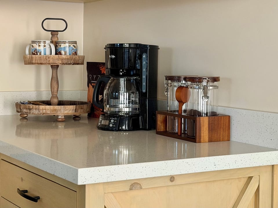 Mr. Coffee, coffee, tea, and coffee condiments.