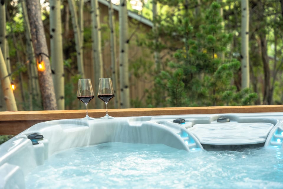 Soak under the stars surrounded by lush pine & aspens in this 4 person hot-tub!