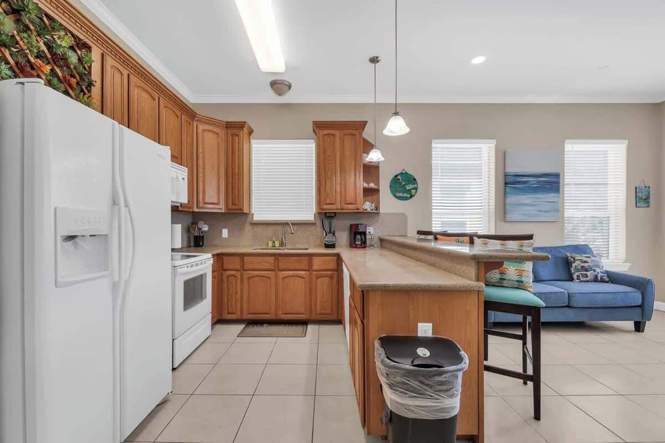 Kitchen Area: Fully equipped kitchen with appliances, cookware, and dining essentials.
