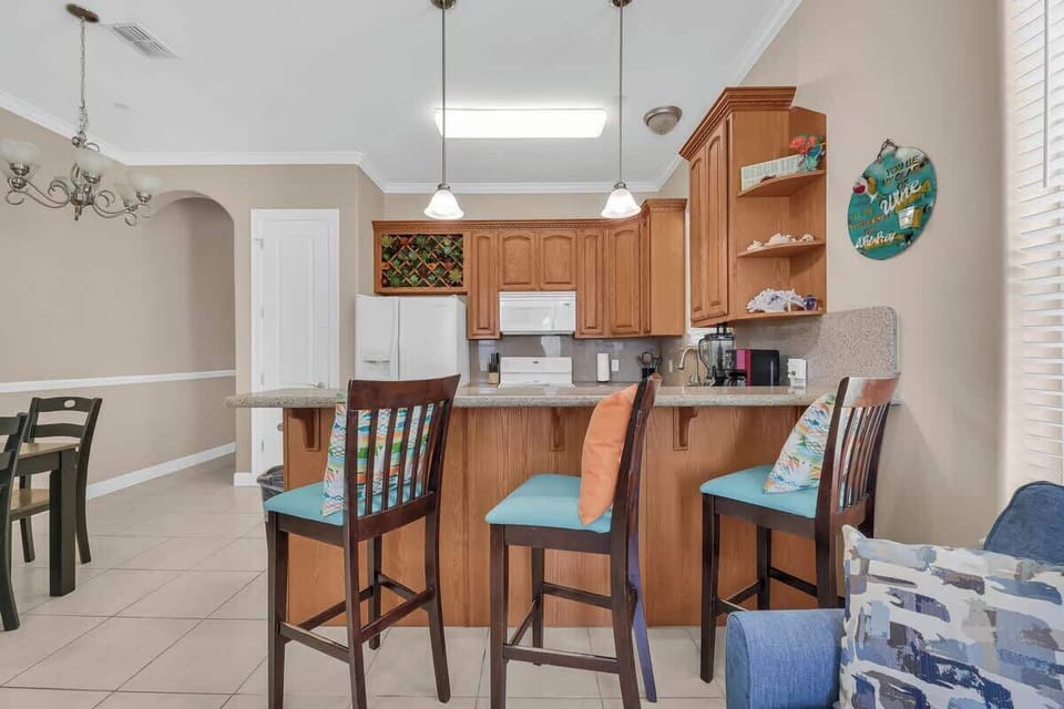 Breakfast bar and island seating for casual dining or morning coffee.