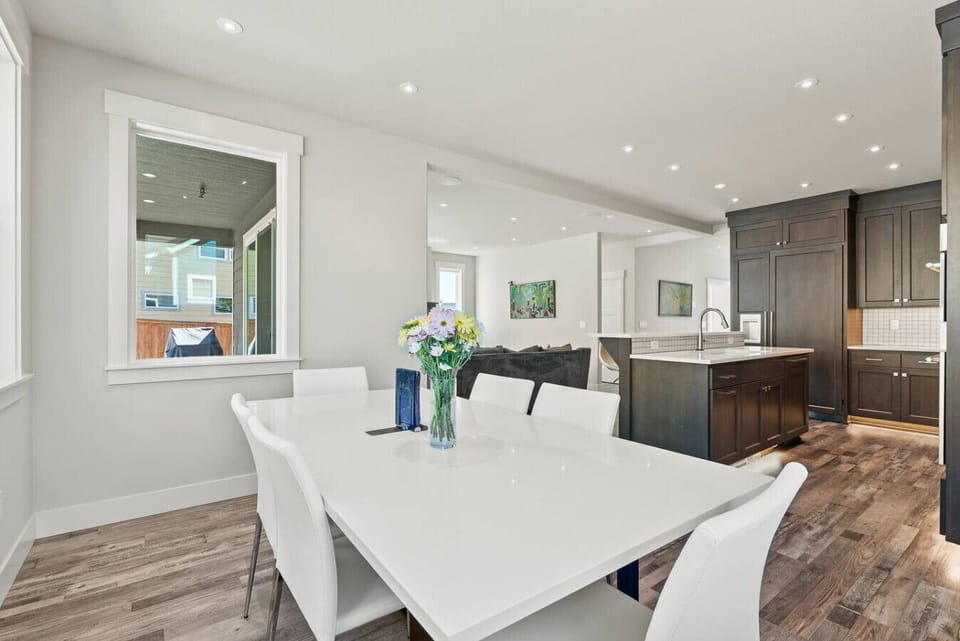 Elegant open-concept layout connecting the kitchen, dining, and living spaces — perfect for effortless entertaining and relaxed gatherings.