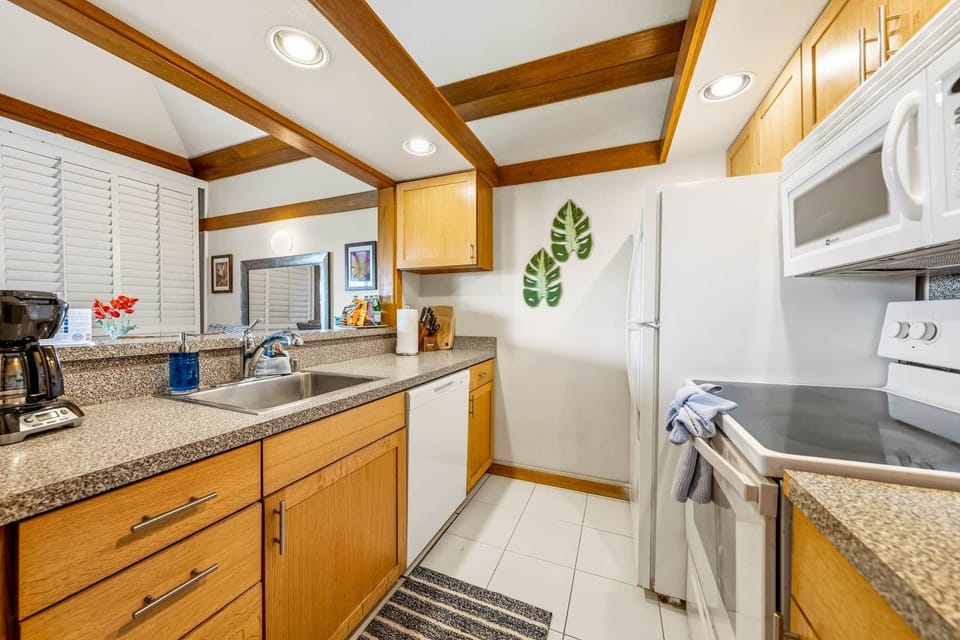 Spacious, well-stocked kitchen with full appliances—perfect for easy meals.