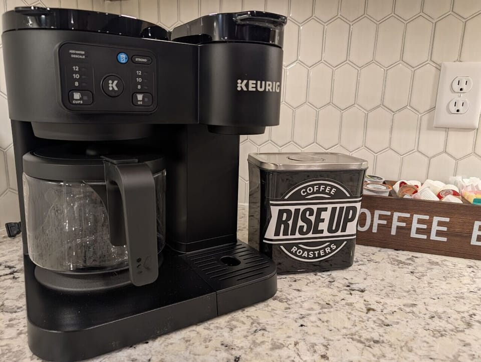 Drip coffee maker, single K-cup or French press options.