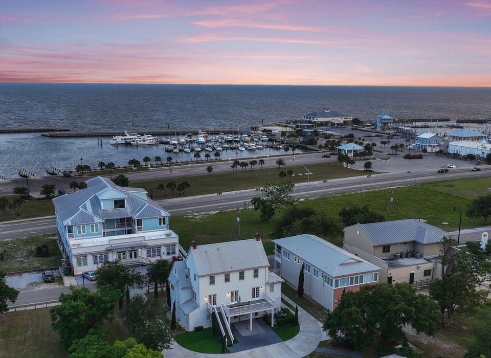 Aerial back view of the property (taken before deck cover)