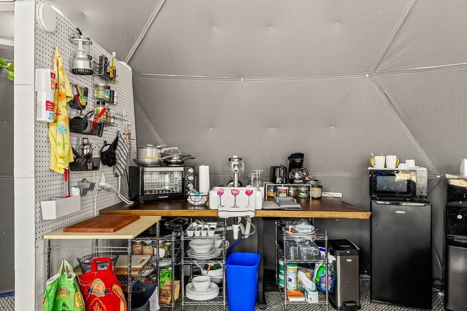 Fuel your morning adventures with fresh coffee and easy meal prep in the well-equipped kitchenette.
