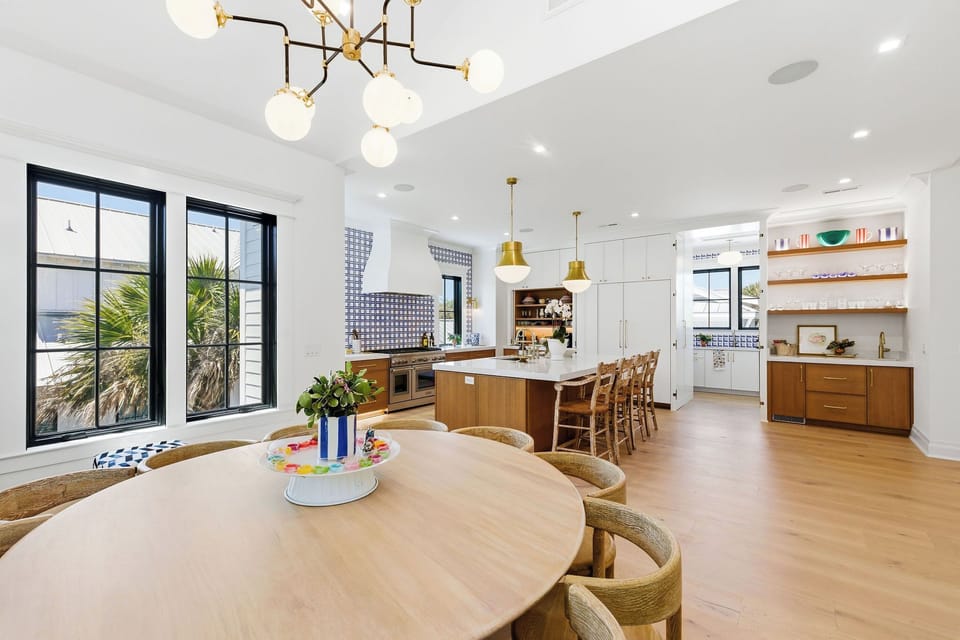 Gourmet kitchen with seating at island for 4 and tucked away scullery
