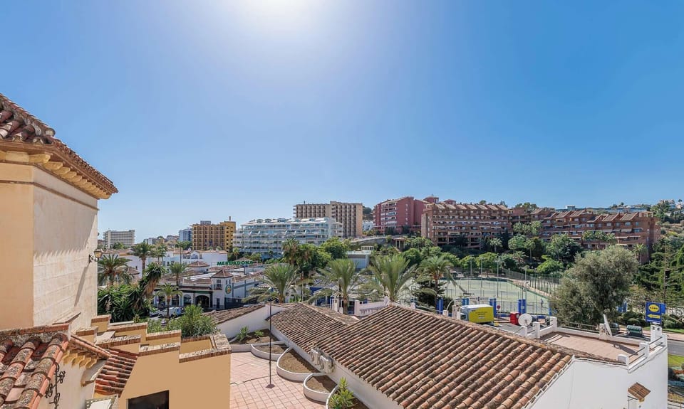 Buildings and palm trees in a cityscape. A beautiful urban landscape architecture urban.