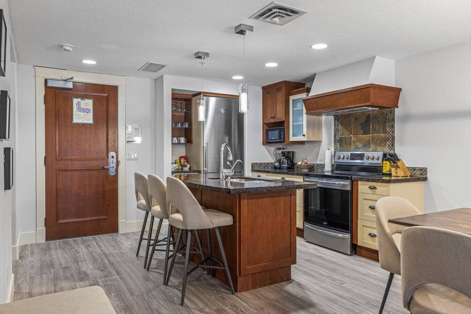 Kitchen island has seating for 3.