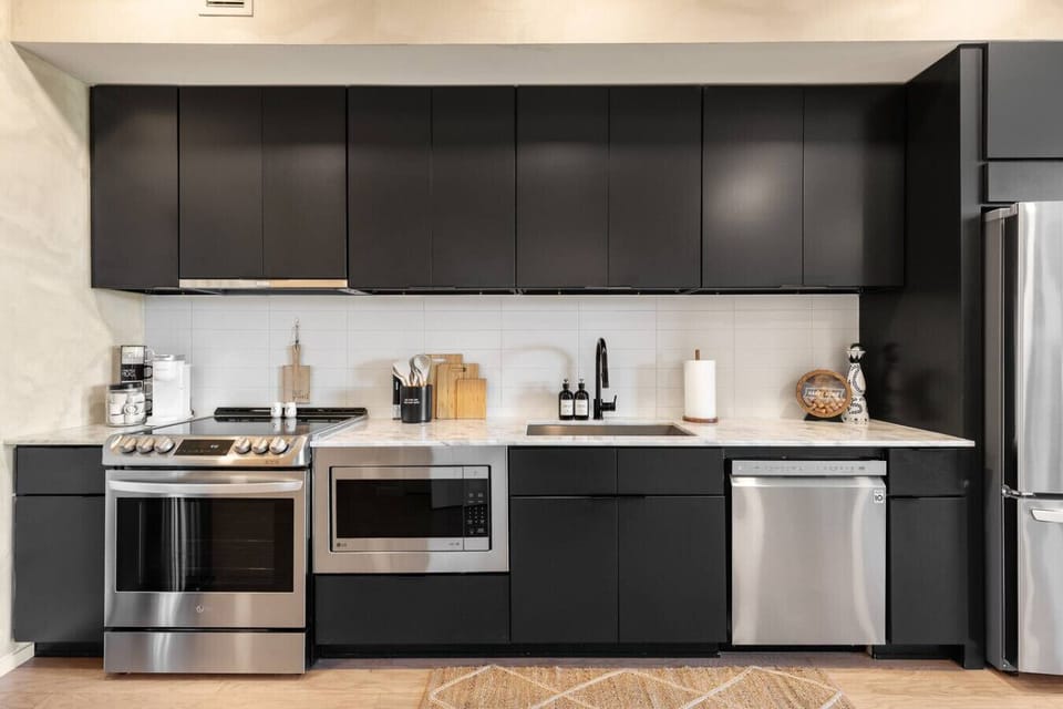 Fully equipped kitchen with high-end appliances.