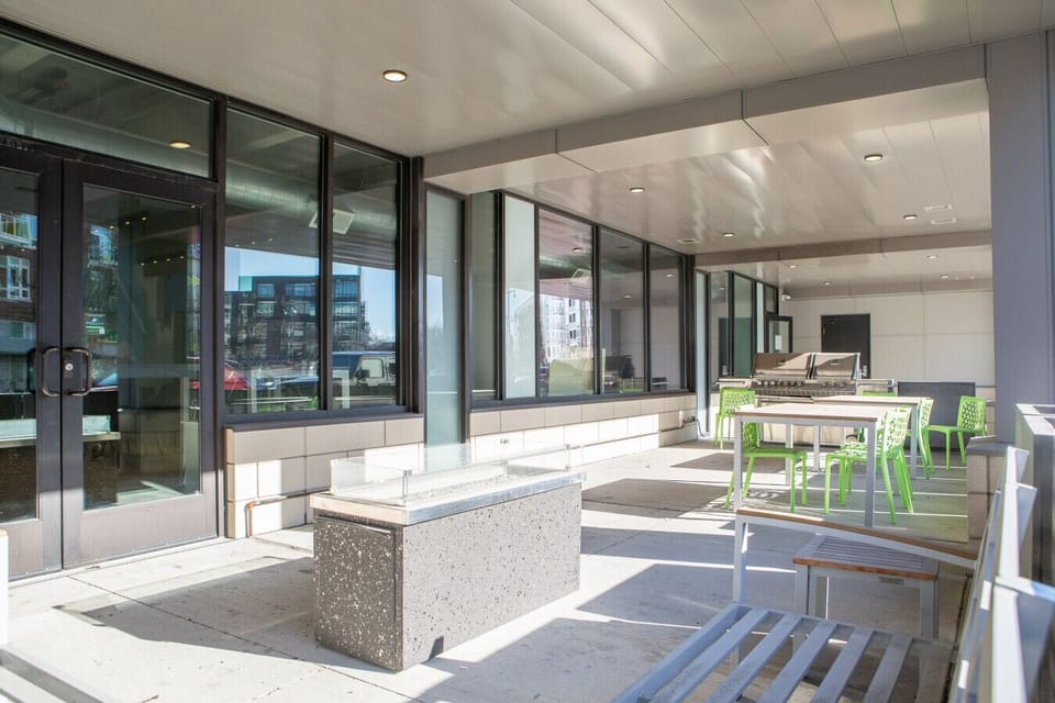 Building exterior & patio with grills