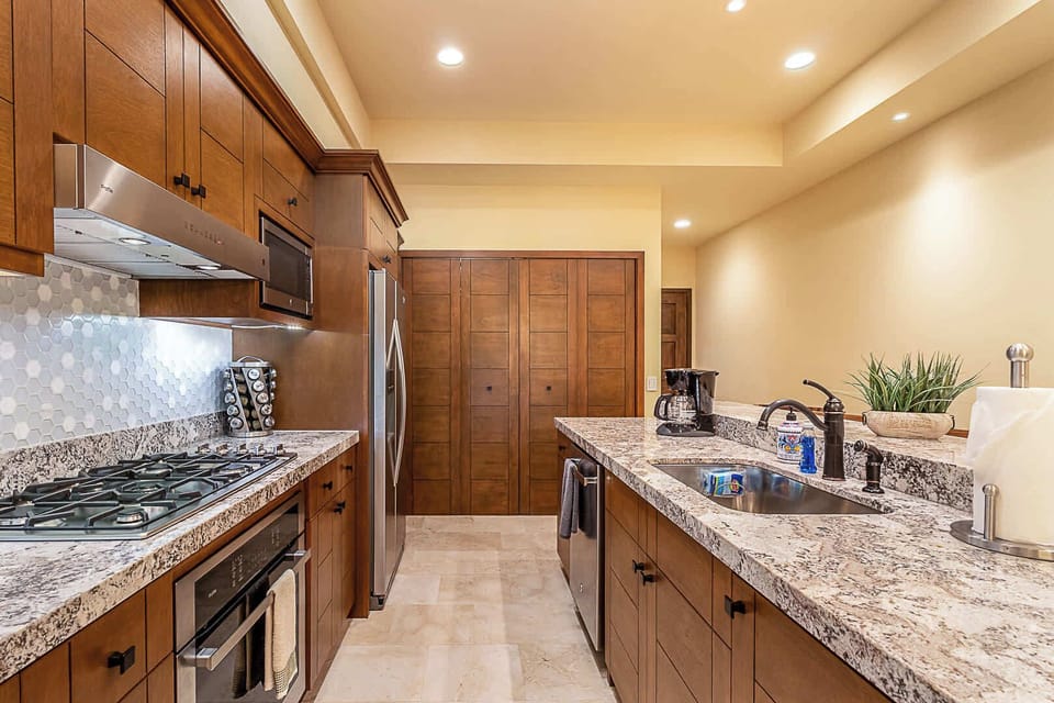 Bright kitchen with spacious layout and island seating.