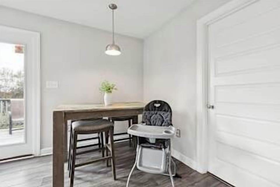 Additional dining table with a high chair. 