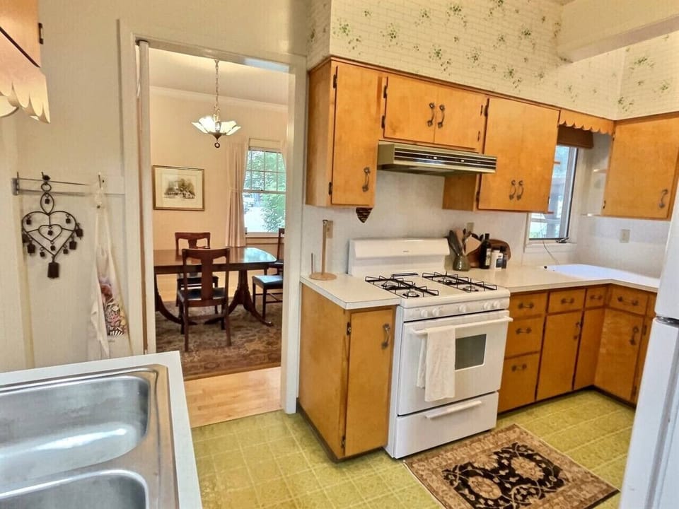 Kitchen with cooking supplies and coffee station