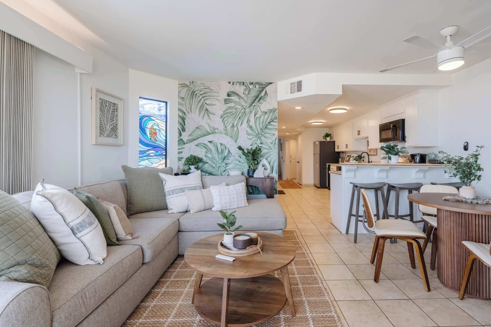 Open-concept living and dining space perfect for gathering after a day at the beach.