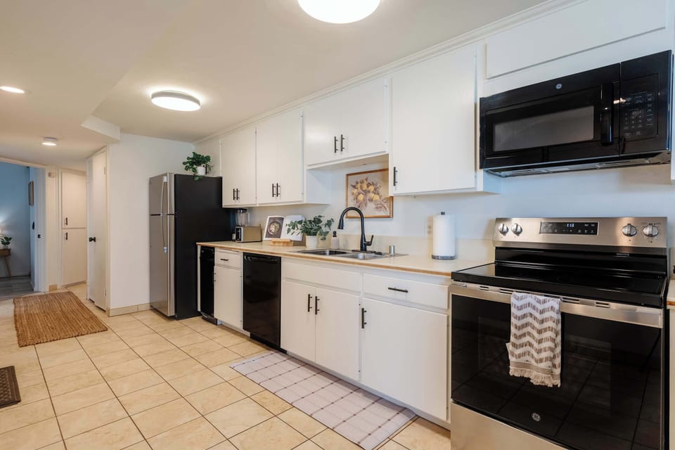 Spacious kitchen with plenty of counter space for shared meals.