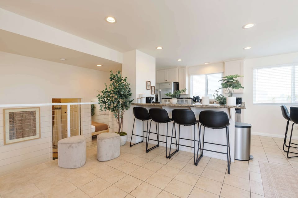 Spacious kitchen + bar seating for gathering