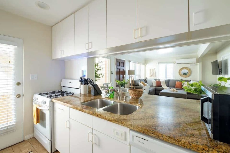 The kitchen features a handy serve-through window 