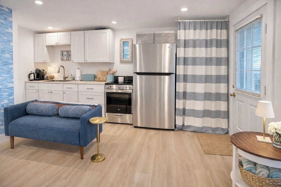 Full size refrigerator with plenty of counter space for cooking in!