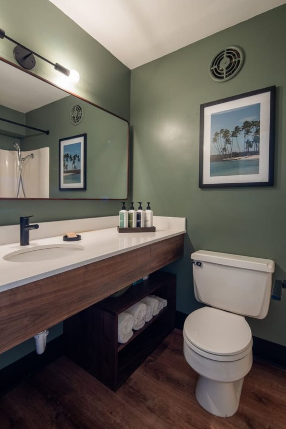 Refresh easily with a sleek vanity and bright lighting.