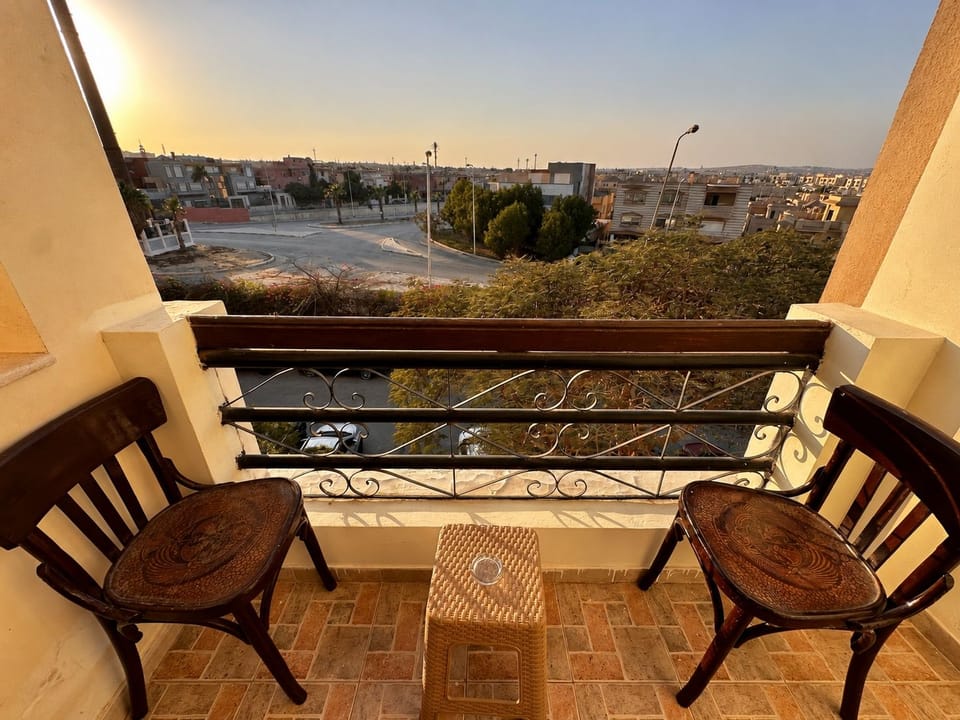 Second furnished balcony with views across the surrounding neighbourhood.