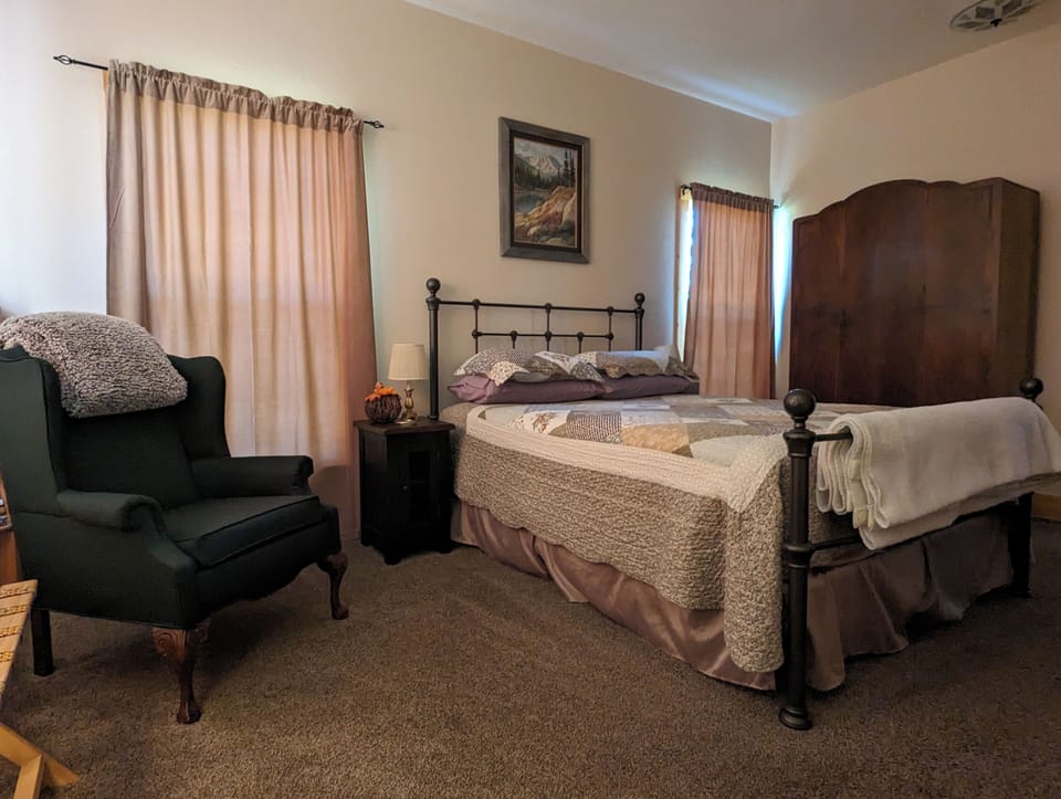 Period furniture fitting to the era of this cozy farmhouse