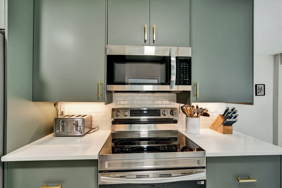Brand new microwave and stove. Stove has built in air fryer