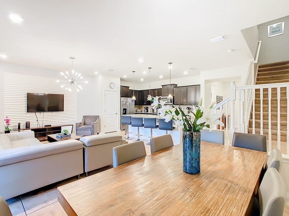 Elegant dining space with seating for six and a bright, airy atmosphere.
