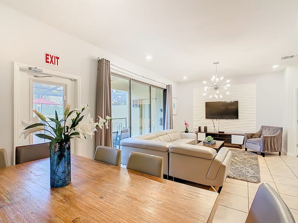 Elegant dining space with seating for six and a bright, airy atmosphere.