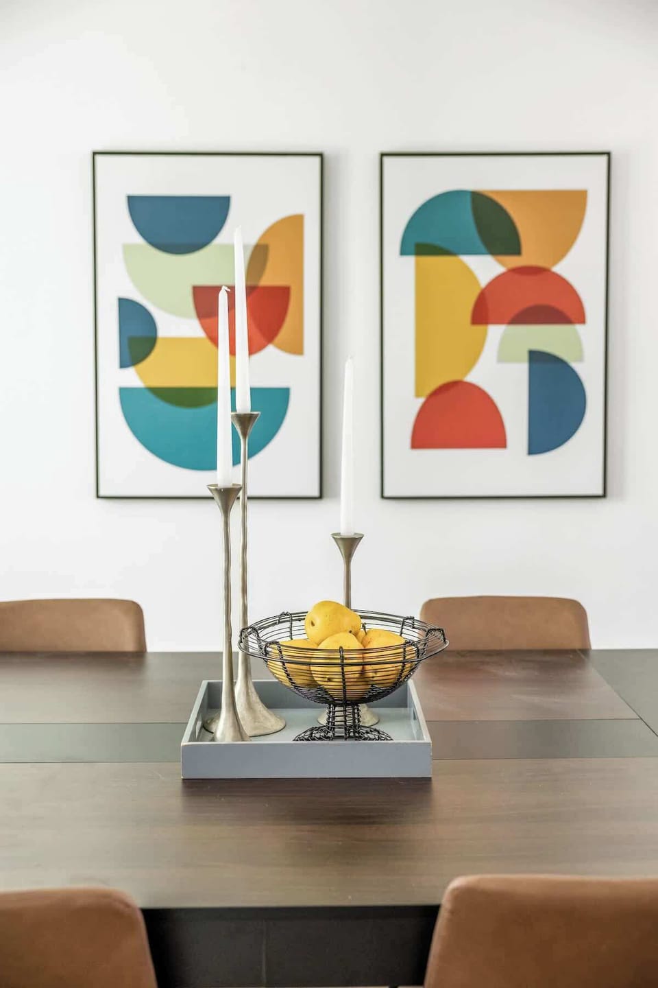Stylish dining detail with modern artwork.