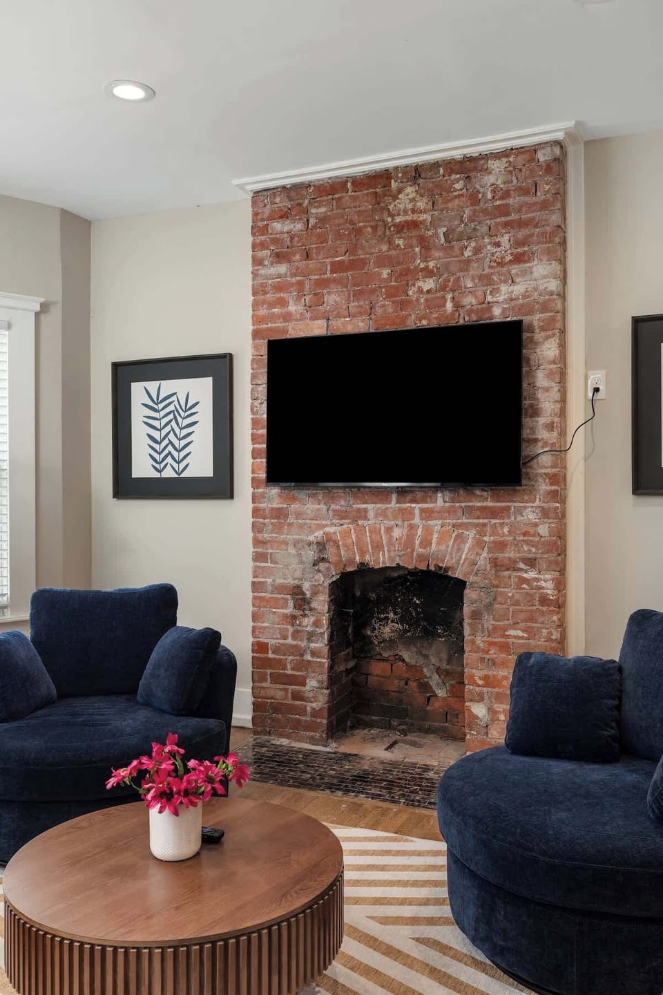 Charming brick fireplace feature wall.