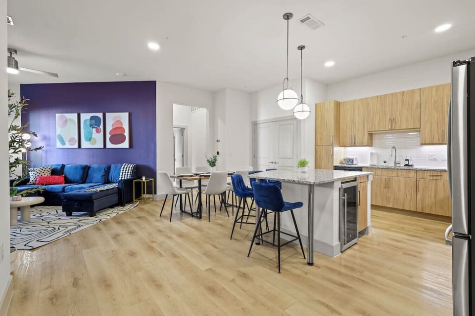 Living Room & Dining Area: Bold decor and modern furnishings create a lively atmosphere for gatherings!