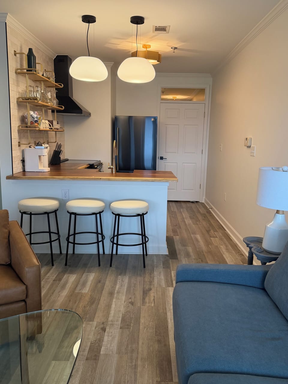 Extra counter-height stools creates a relaxed spot for dinning and conservation