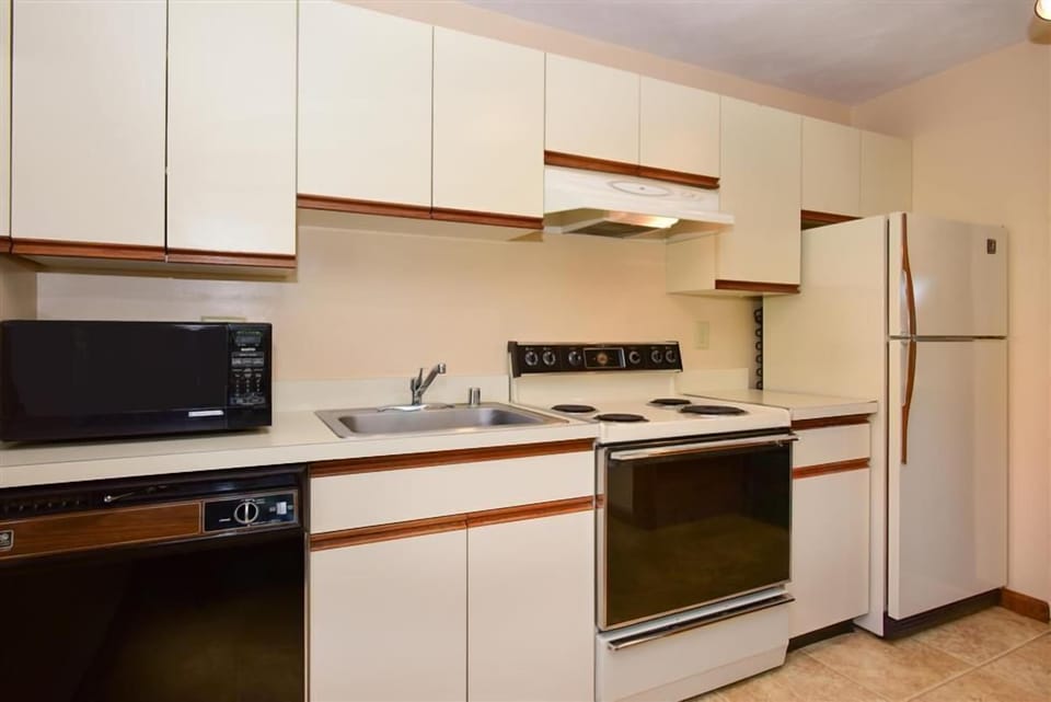 Bright, functional kitchen ready for quiet mornings or casual evenings at home.