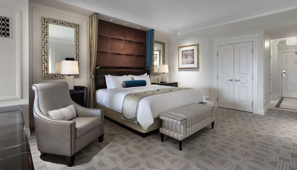 Unwind in plush bedding and lounge in elegant comfort.